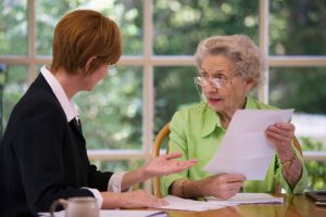 Senior woman meeting with agent